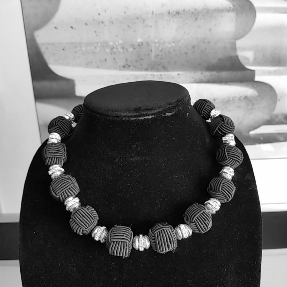 A two- textured necklace